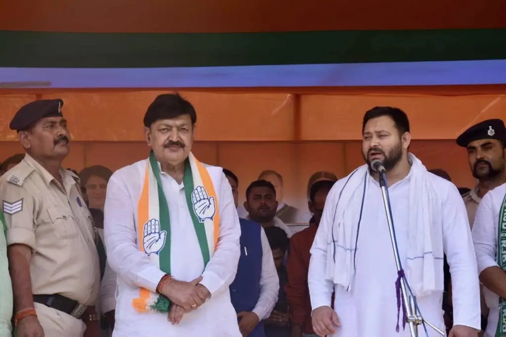 Ajit Sharma with Tejashwi Yadav.