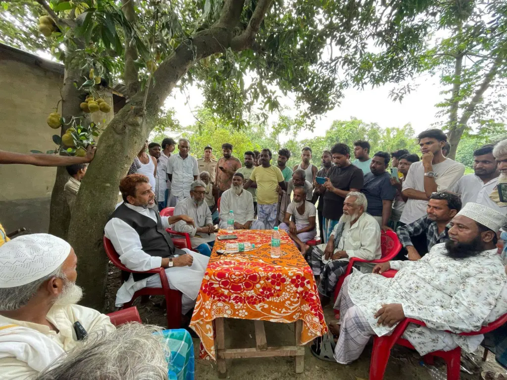 Aktarul Iman interacting with the people.