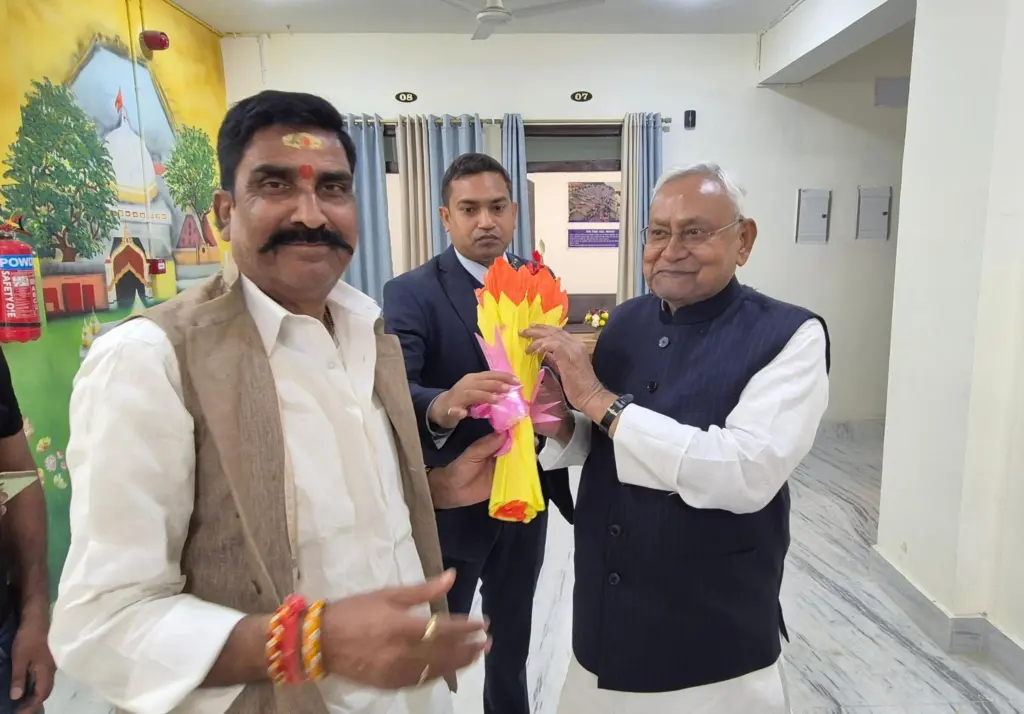 Sanjay Kumar Tiwari with Chief Minister Nitish Kumar.
