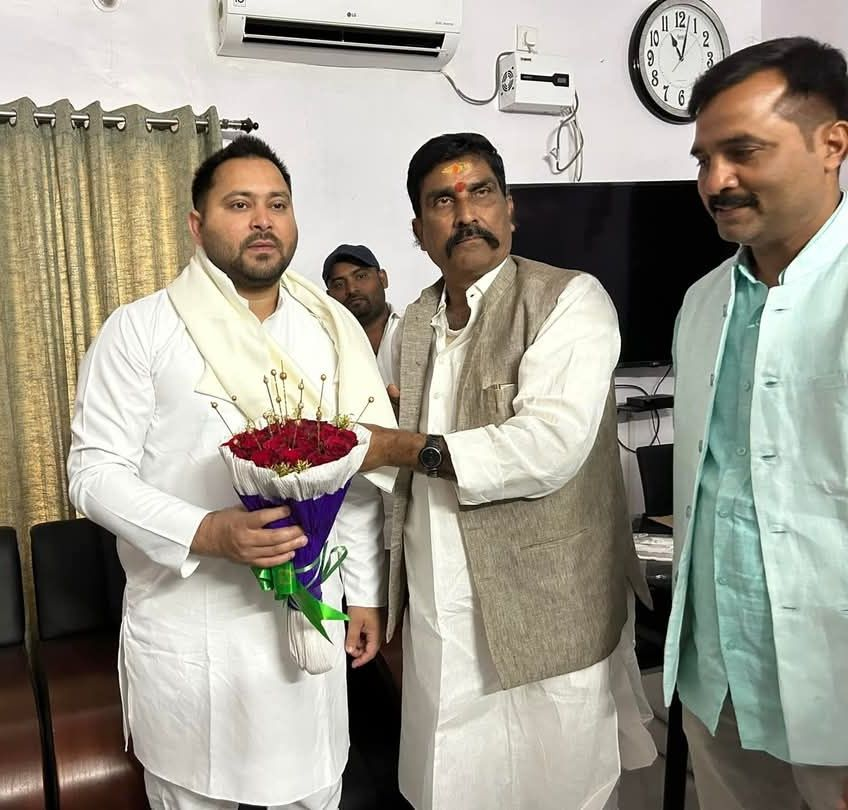 Sanjay Kumar Tiwari with Tejashwi Yadav.